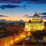 Rome, Italy. St. Peter's cathedral in sunset lights